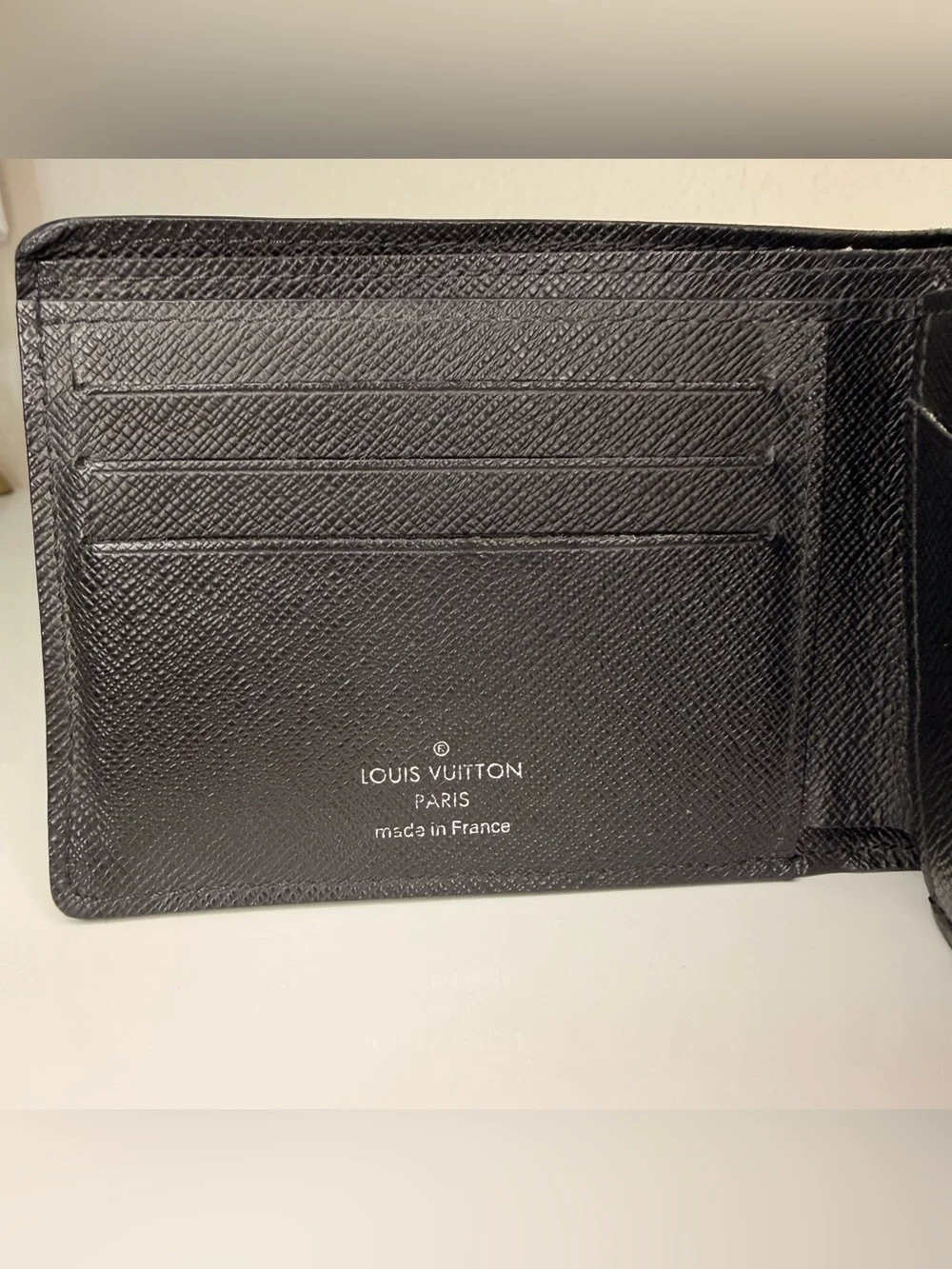 Authentic Louis Vuitton Black Epi Leather Bi-Fold Wallet